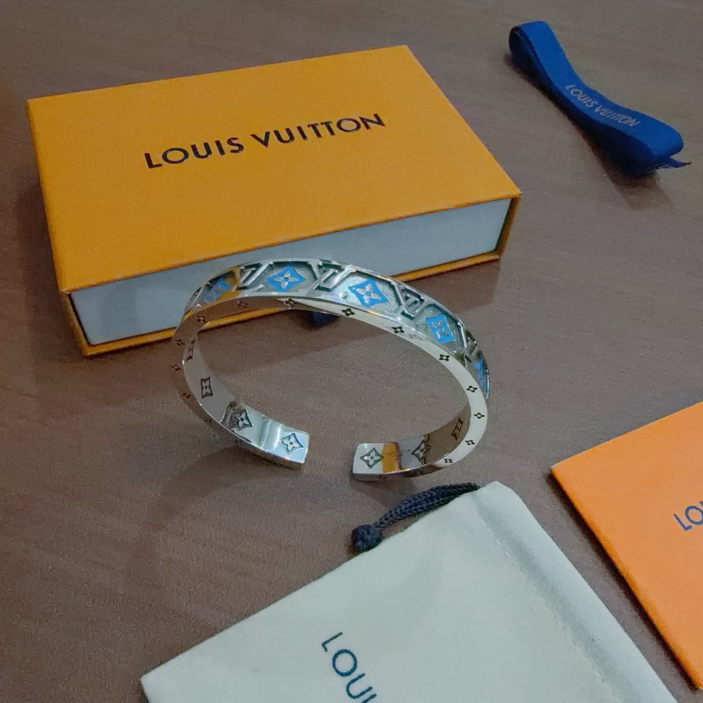Louis Vuitton Silver Bracelet with Blue and Orange Accents